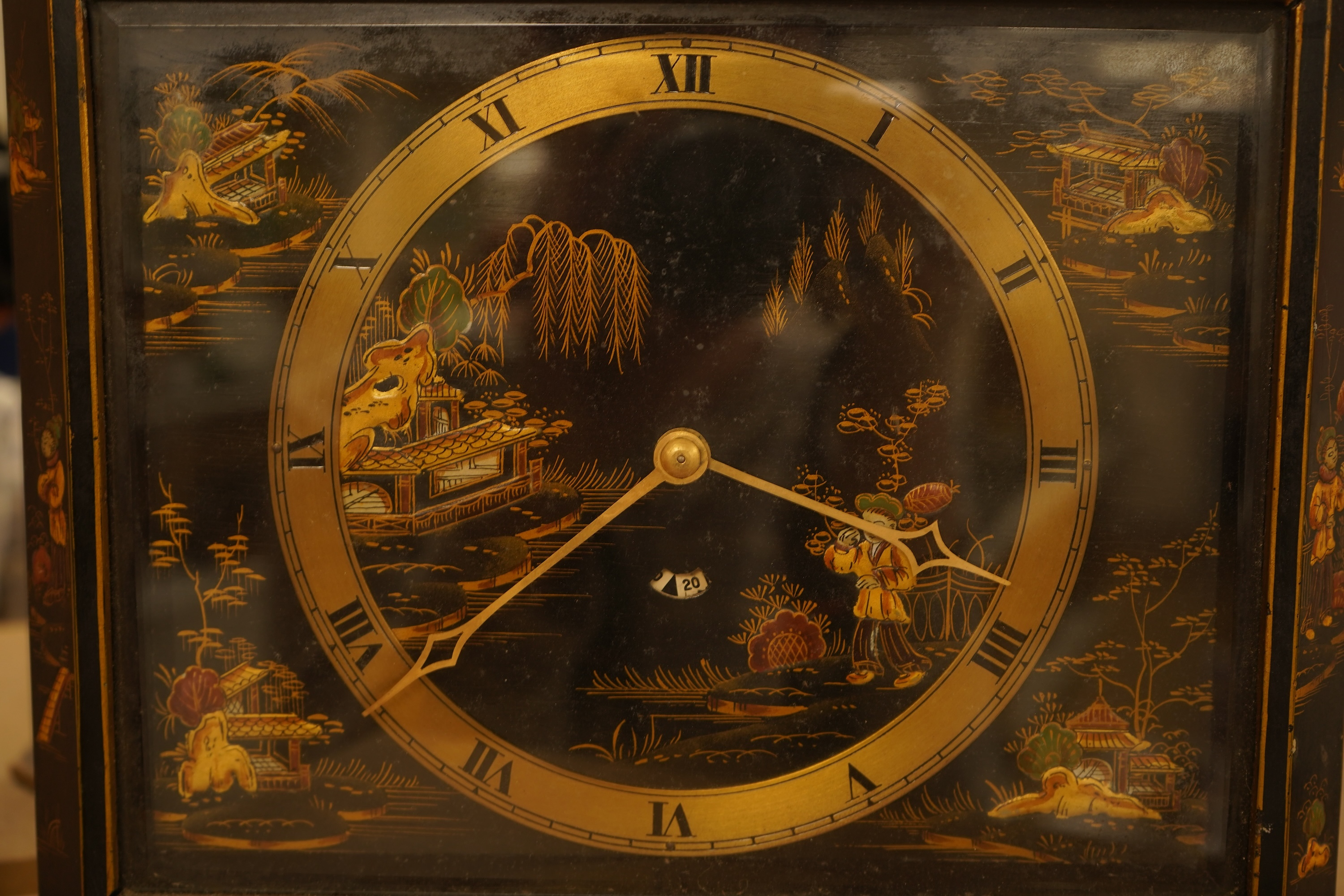 A Smith's electric chinoiserie lacquered mantel clock, 28cm wide